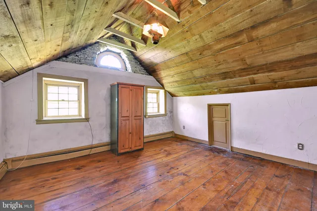 a view of outdoor space with deck and hardwood