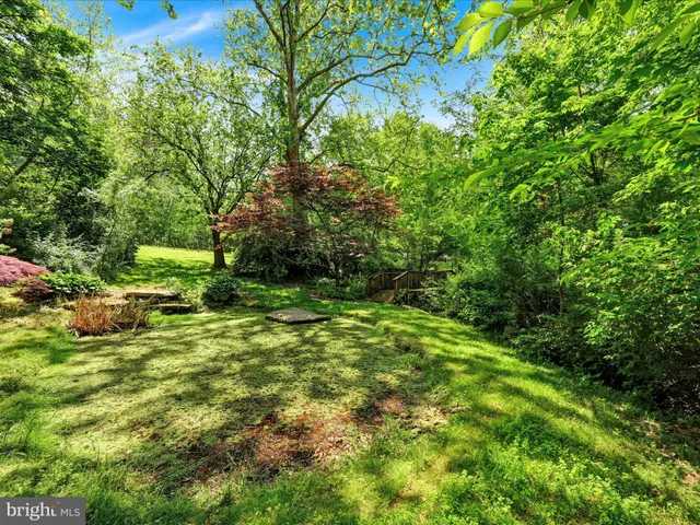 a garden view with a sitting space