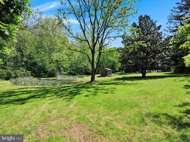 a view of a backyard of a house