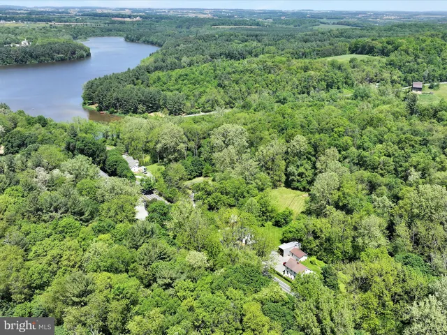 a view of a house with snow yard