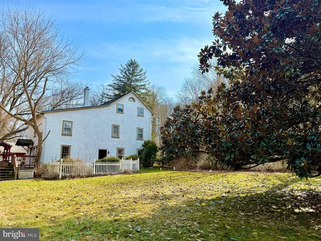 a view of a garden with a building