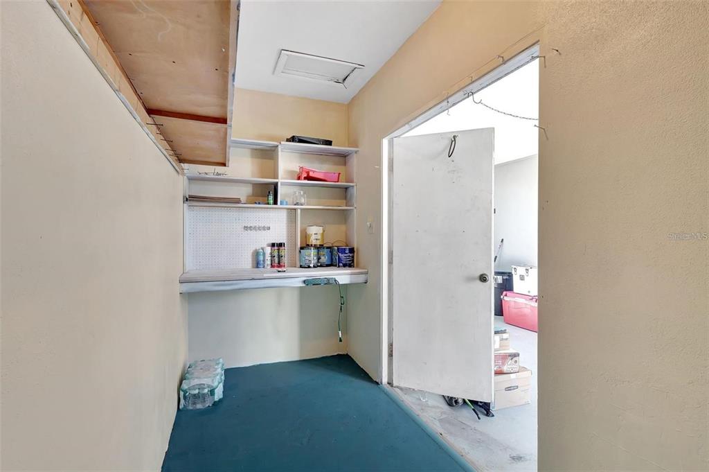 250 Bangsberg Road Southeast Port Charlotte, FL 33952 - Photo 26 of 59 a room with storage and utility