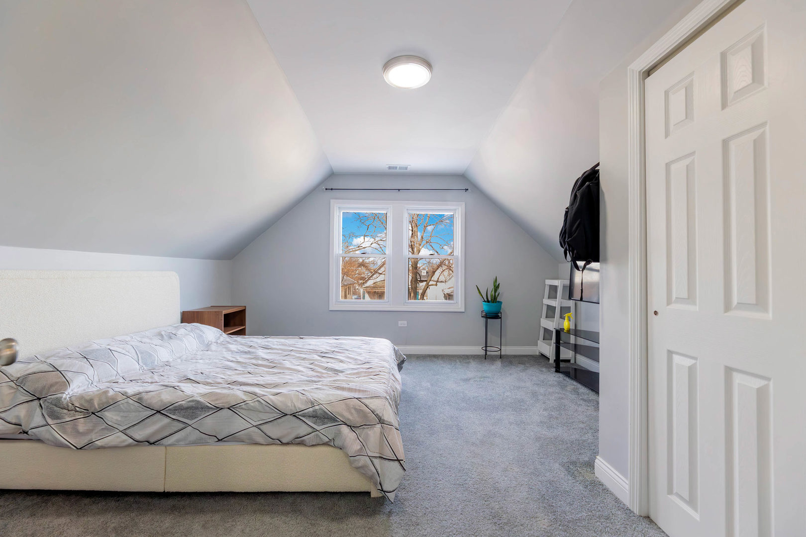 1473 West 73rd Street Chicago, IL 60636 - Photo 14 of 28 a bedroom with a bed next to a window with outer view