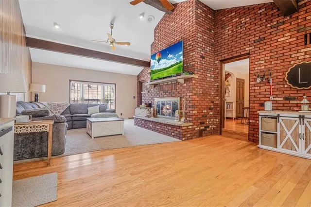 a view of a fireplace with a sitting area