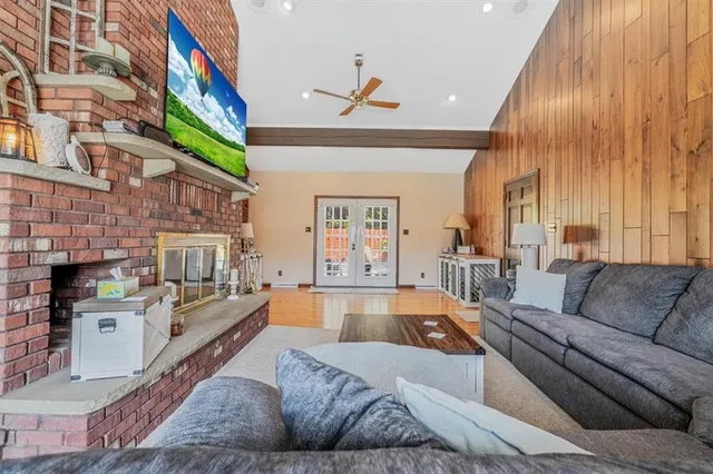 a bedroom with double bed and a window