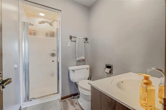 a dining room with furniture and a window