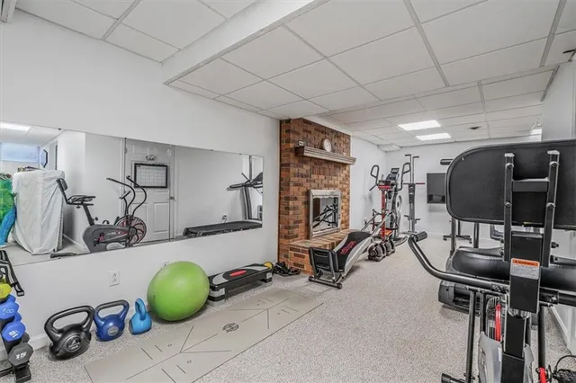 a bathroom with a shower and a sink
