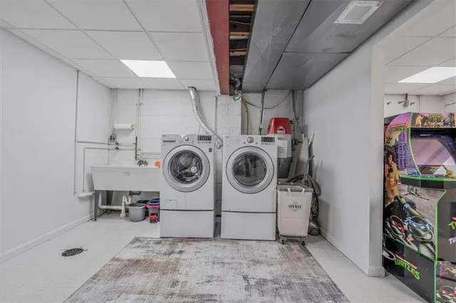 a utility room with dryer and washer