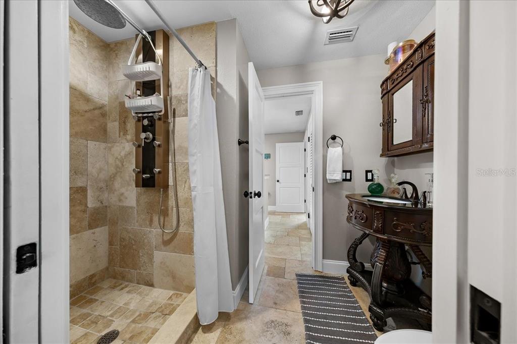 452 Southeast Paradise Point Road Crystal River, FL 34429 - Photo 12 of 83 a view of a walk in closet and bathroom