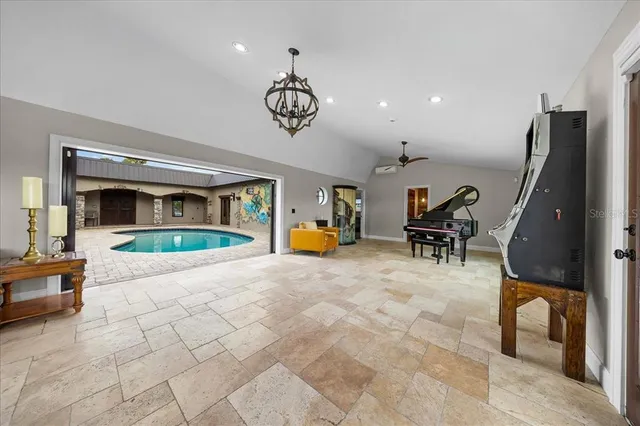 a view of washer and dryer with kitchen in the background