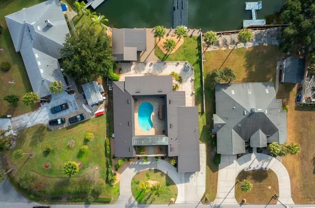 a view of a kitchen with a sink and cabinets