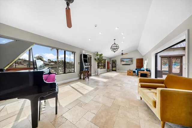 a kitchen with stainless steel appliances granite countertop a stove a sink dishwasher and a refrigerator