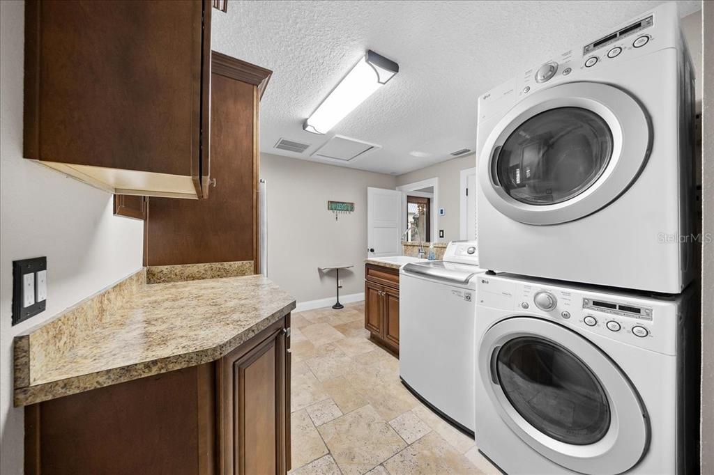 452 Southeast Paradise Point Road Crystal River, FL 34429 - Photo 38 of 83 a view of a kitchen with washer and dryer