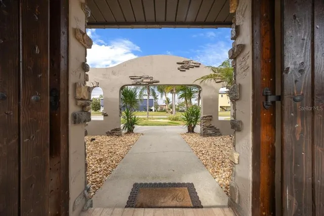 a picture of a potted plants in front of a house