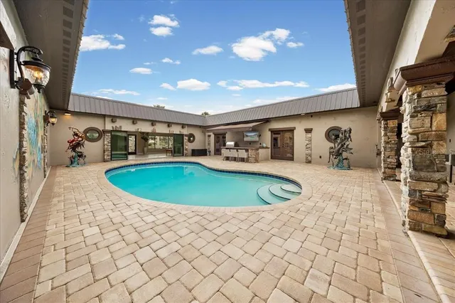 a view of a house with a yard