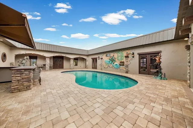 a view of outdoor space yard and swimming pool