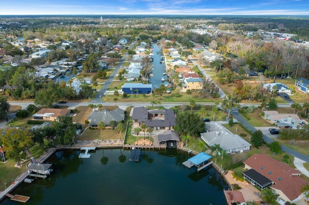 452 Southeast Paradise Point Road Crystal River, FL 34429 - Photo 77 of 83 an aerial view of residential houses with outdoor space