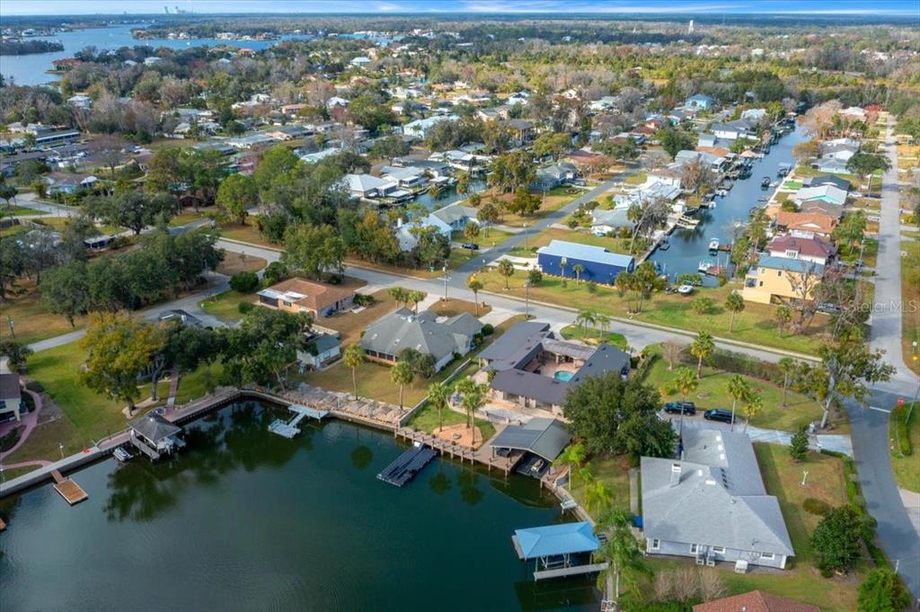 452 Southeast Paradise Point Road Crystal River, FL 34429 - Photo 79 of 83 an aerial view of residential houses with outdoor space