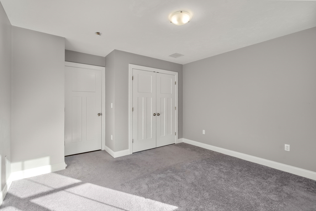 93 Providence Street, Unit B Mendon, MA 01756 - Photo 21 of 38 a view of an empty room