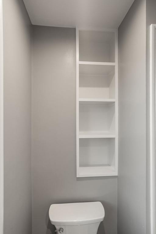 93 Providence Street, Unit B Mendon, MA 01756 - Photo 23 of 38 a bathroom with a toilet