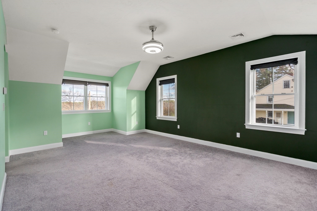93 Providence Street, Unit B Mendon, MA 01756 - Photo 25 of 38 an empty room with windows and closet