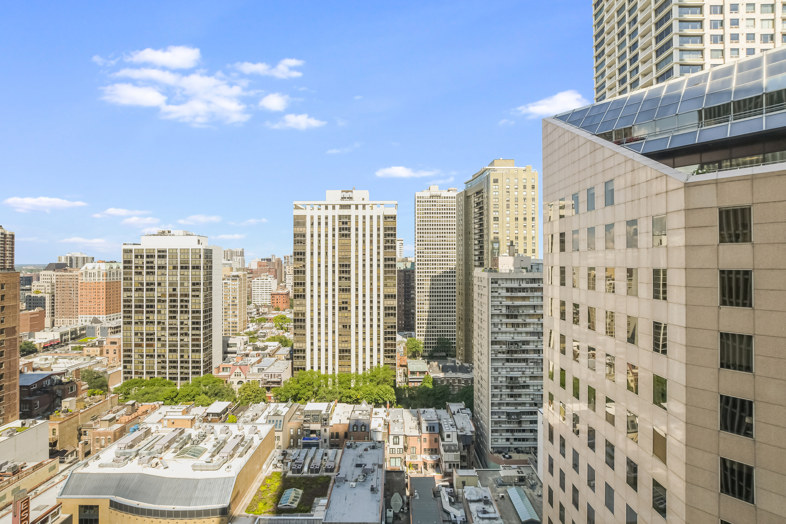 100 East Walton Street, Unit 26A Chicago, IL 60611 - Photo 16 of 23 a view of a city with tall buildings