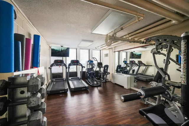 a view of a room with gym equipment