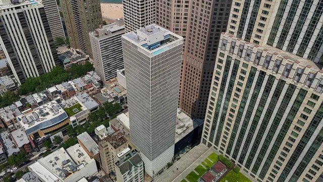 a view of swimming pool with chairs