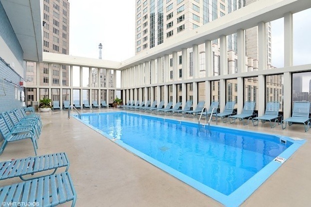 100 East Walton Street, Unit 26A Chicago, IL 60611 - Photo 23 of 23 a view of swimming pool with chairs