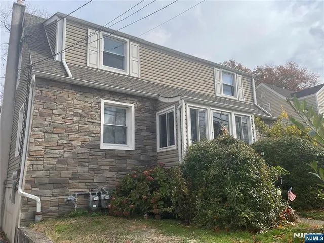 a brick building with a yard