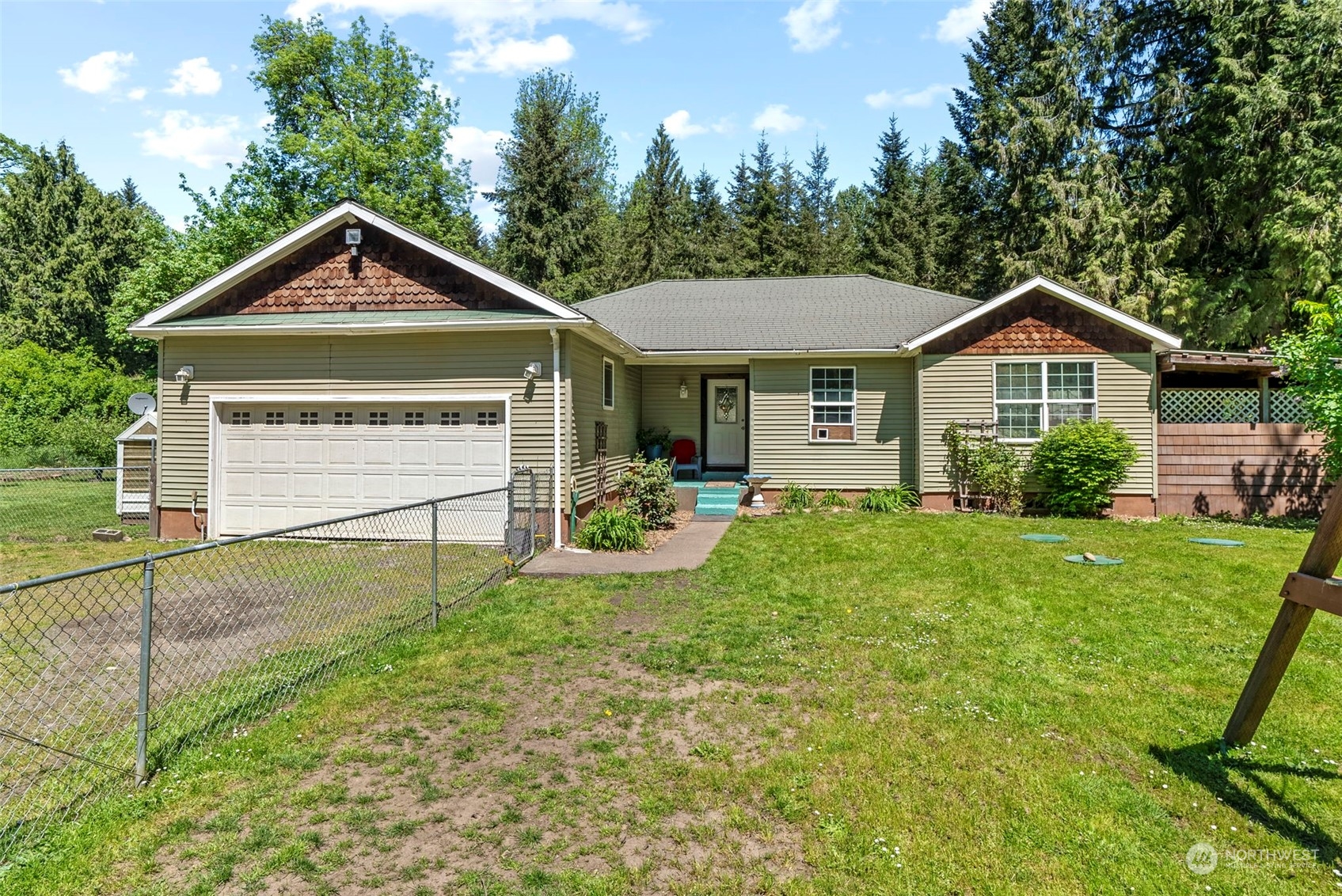 455 Drews Prairie Road Toledo, WA 98591 - Photo 1 of 31 a front view of a house with yard and green space