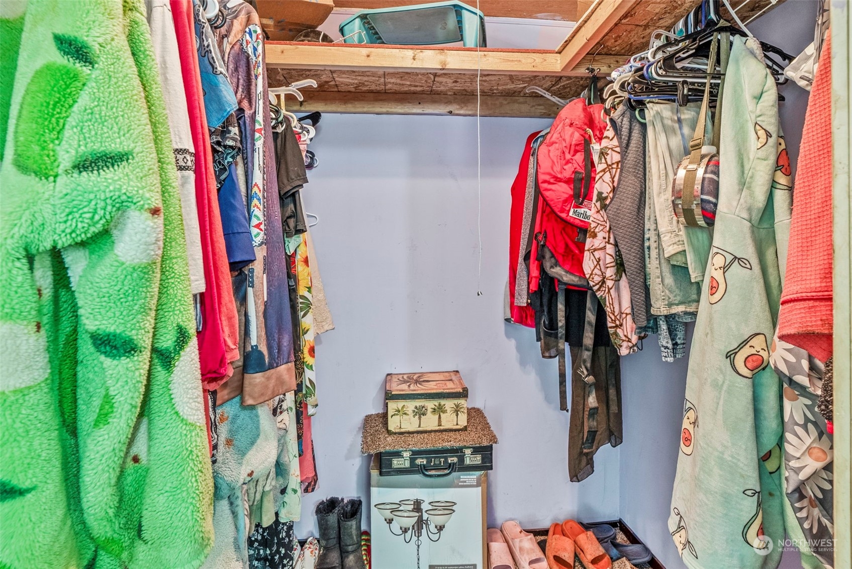 455 Drews Prairie Road Toledo, WA 98591 - Photo 21 of 31 a view of walk in closet with clothes and shoes