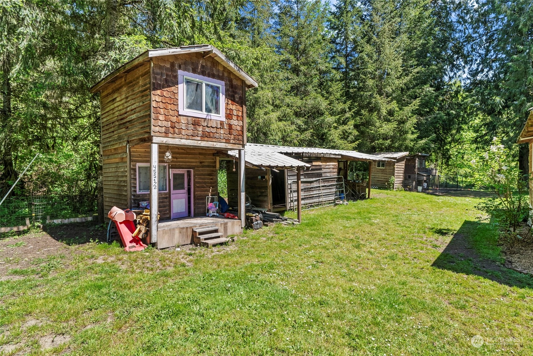 455 Drews Prairie Road Toledo, WA 98591 - Photo 26 of 31 a view of a house with backyard sitting area and garden