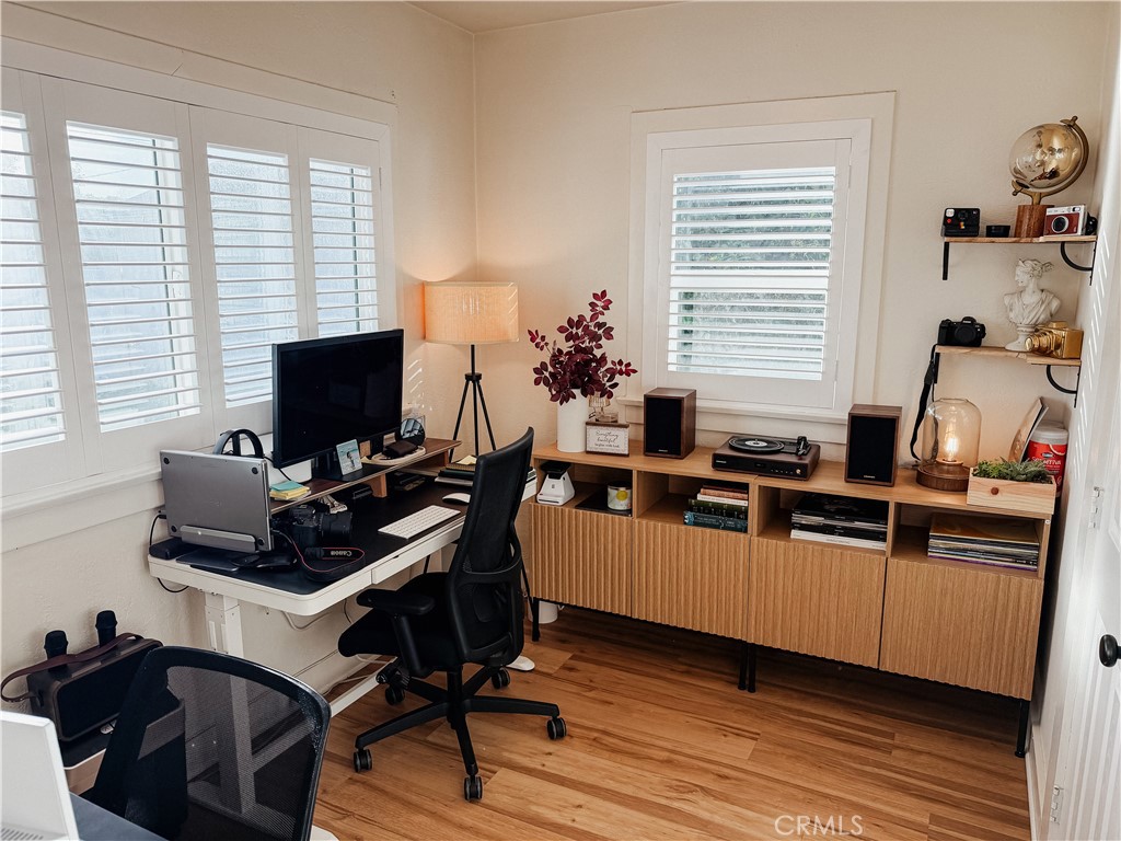 2714 Denton Street Riverside, CA 92507 - Photo 15 of 20 a room with furniture and a wooden floor