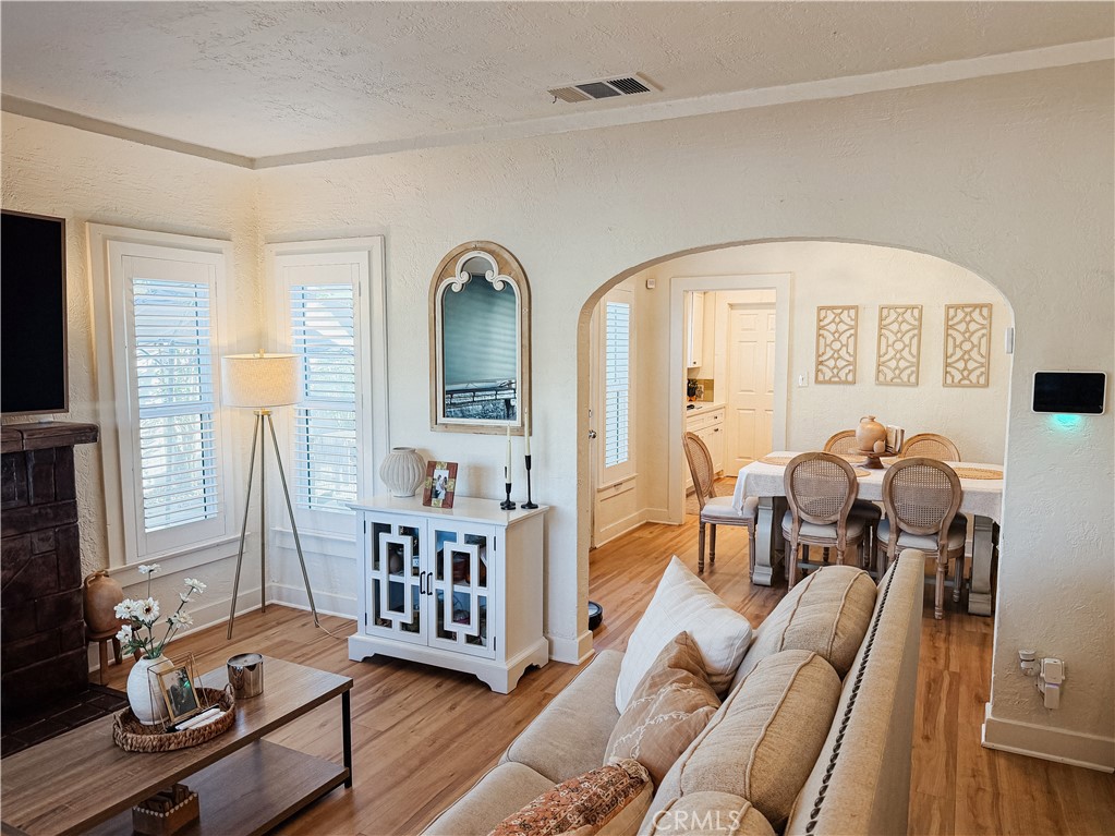 2714 Denton Street Riverside, CA 92507 - Photo 5 of 20 a living room with furniture and wooden floor