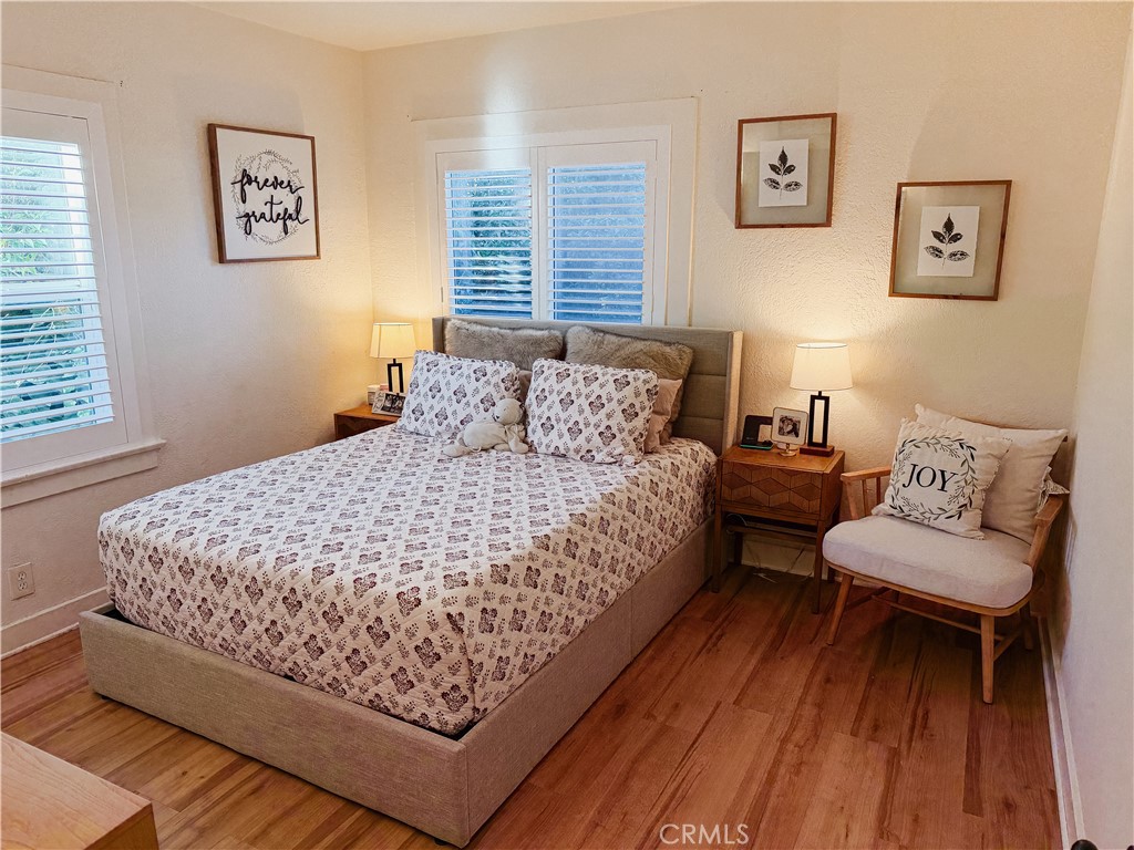 2714 Denton Street Riverside, CA 92507 - Photo 10 of 20 a bedroom with a bed and a couch