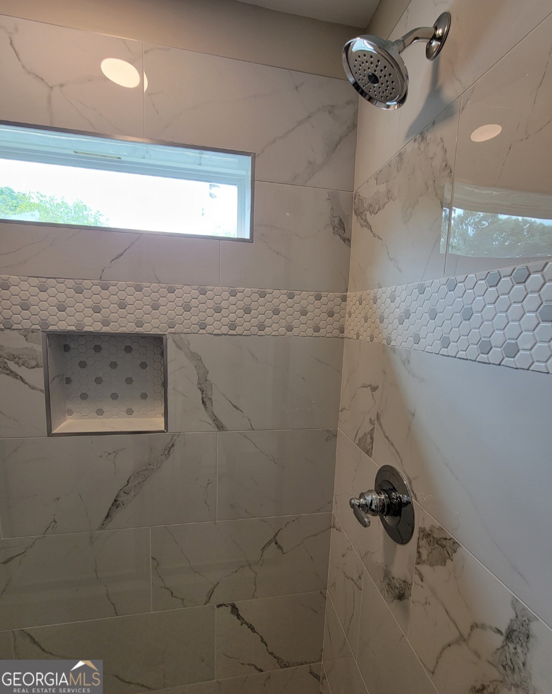 429 Ash Monroe, GA 30655 - Photo 7 of 9 a bathroom with a shower