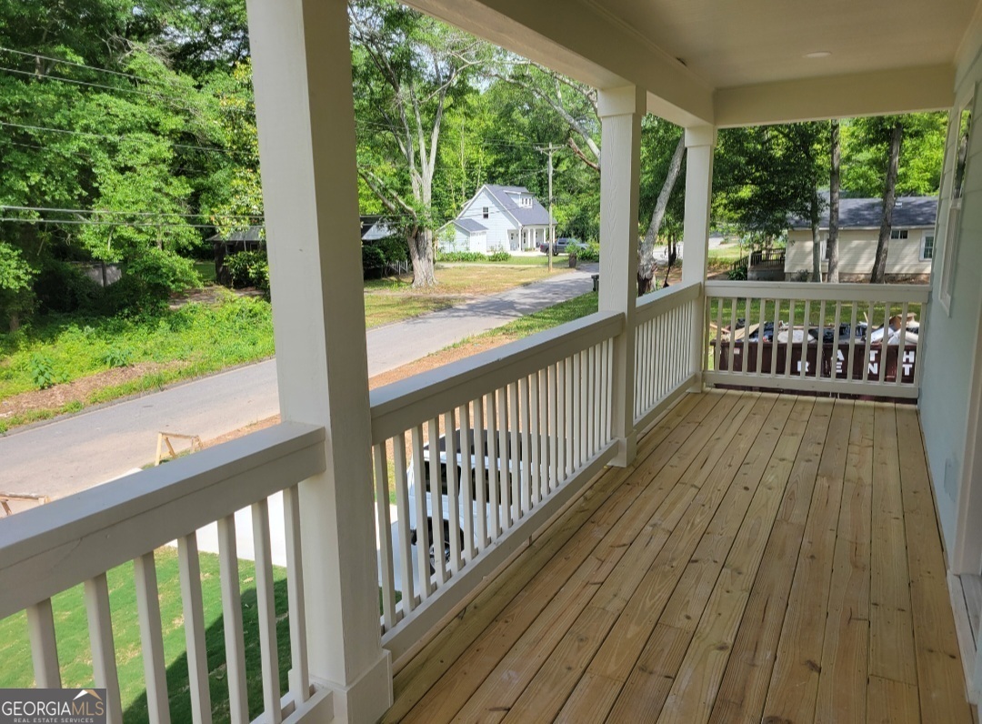 429 Ash Monroe, GA 30655 - Photo 8 of 9 a view of a two chairs in the balcony