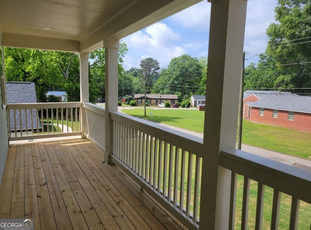 429 Ash Monroe, GA 30655 - Photo 9 of 9 a view of balcony with wooden floor