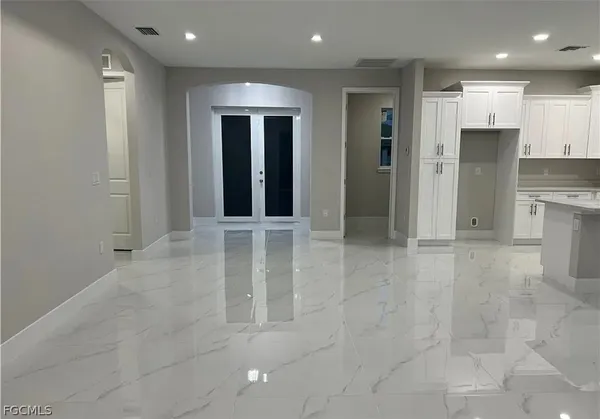 a view of entryway with kitchen