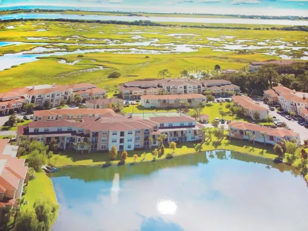 a view of a city with an ocean beach