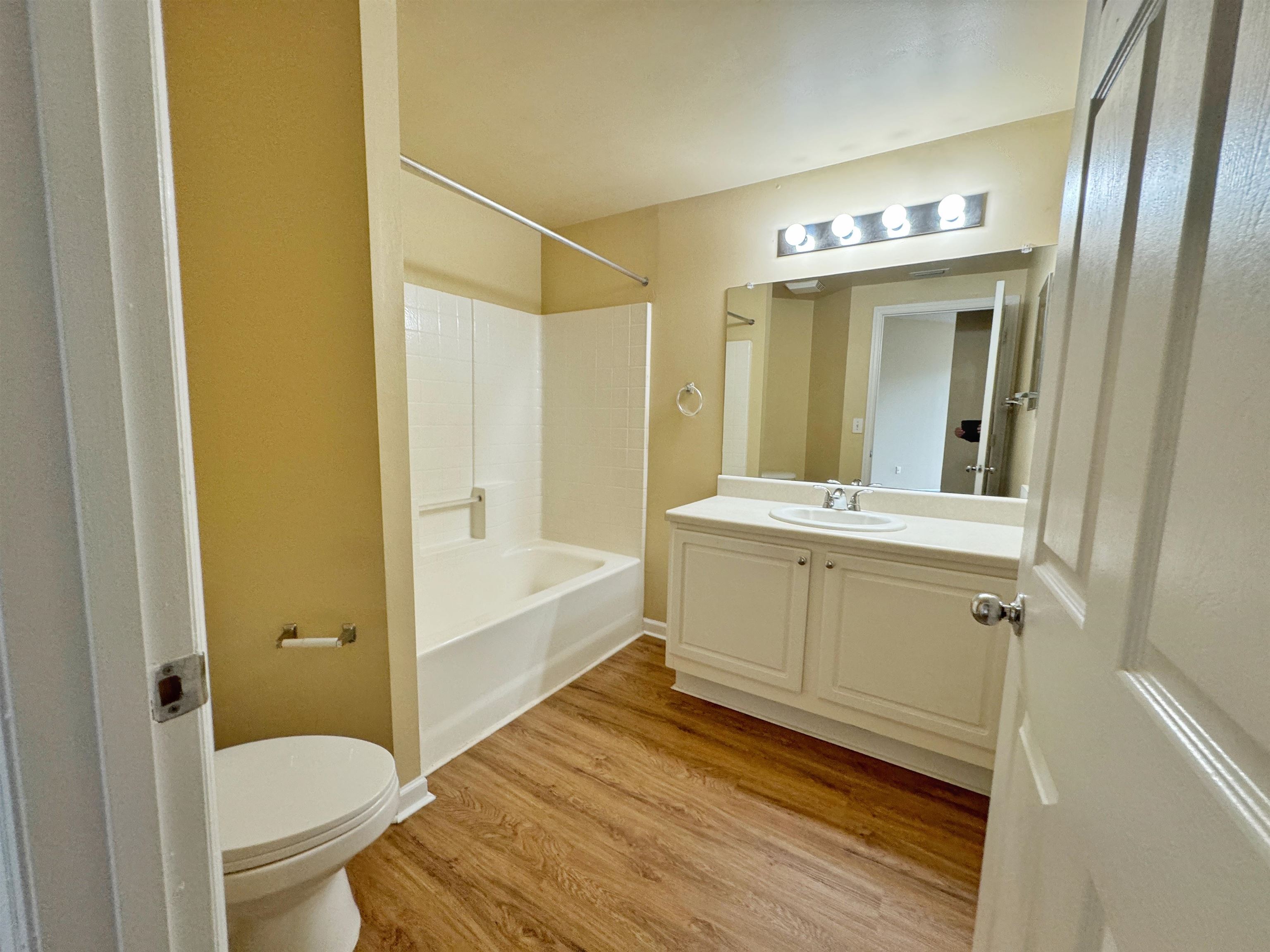 4035 Grande Vista Boulevard, Unit 201 St. Augustine, FL 32084 - Photo 17 of 28 a bathroom with a sink a toilet and shower