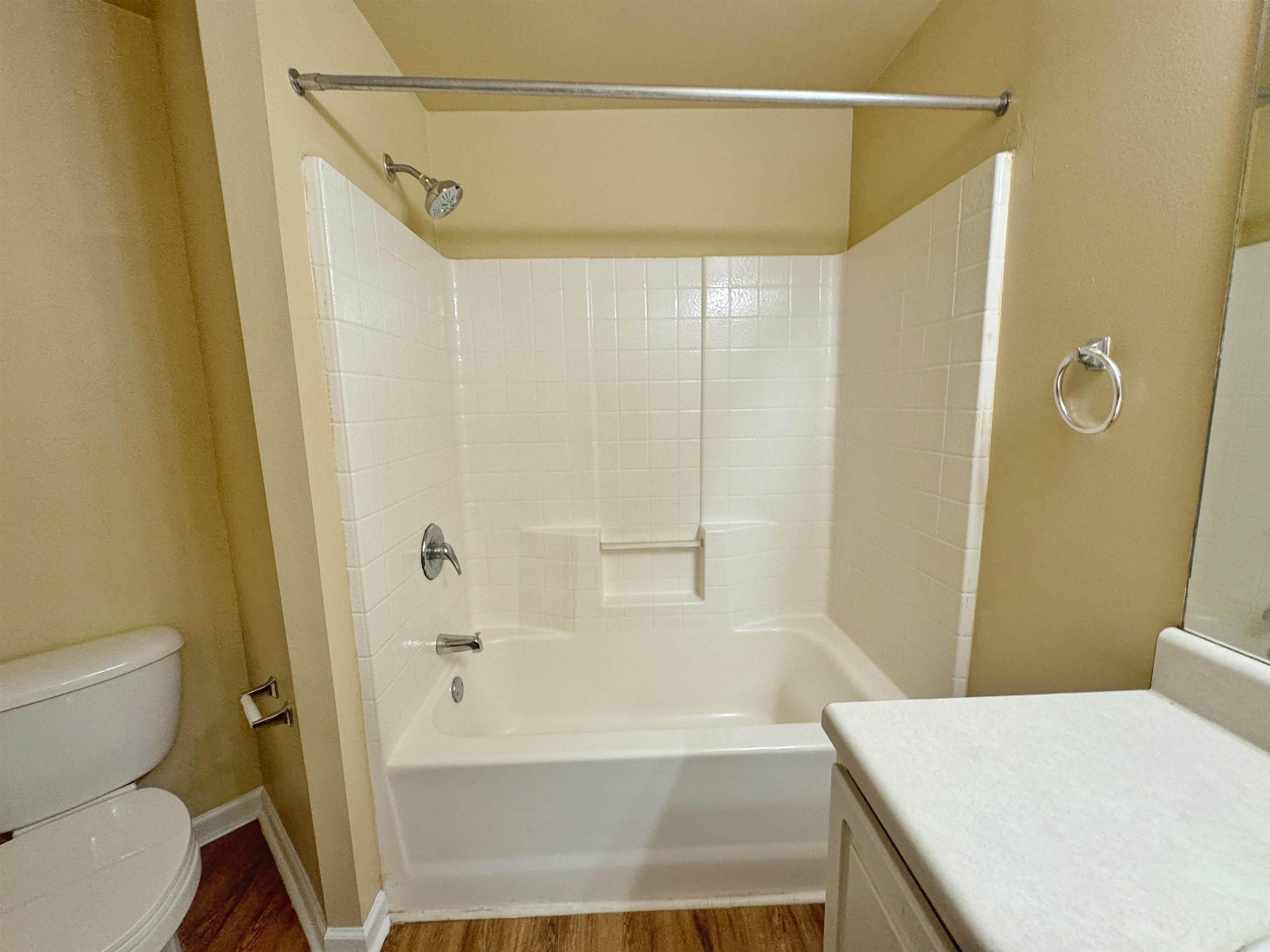 4035 Grande Vista Boulevard, Unit 201 St. Augustine, FL 32084 - Photo 18 of 28 a bathroom with a bathtub and a shower
