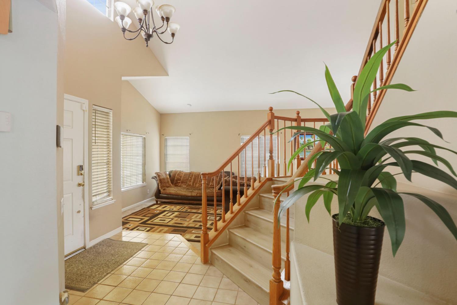 1725 Mark Mead Lane Modesto, CA 95356 - Photo 2 of 52 a living room with chairs