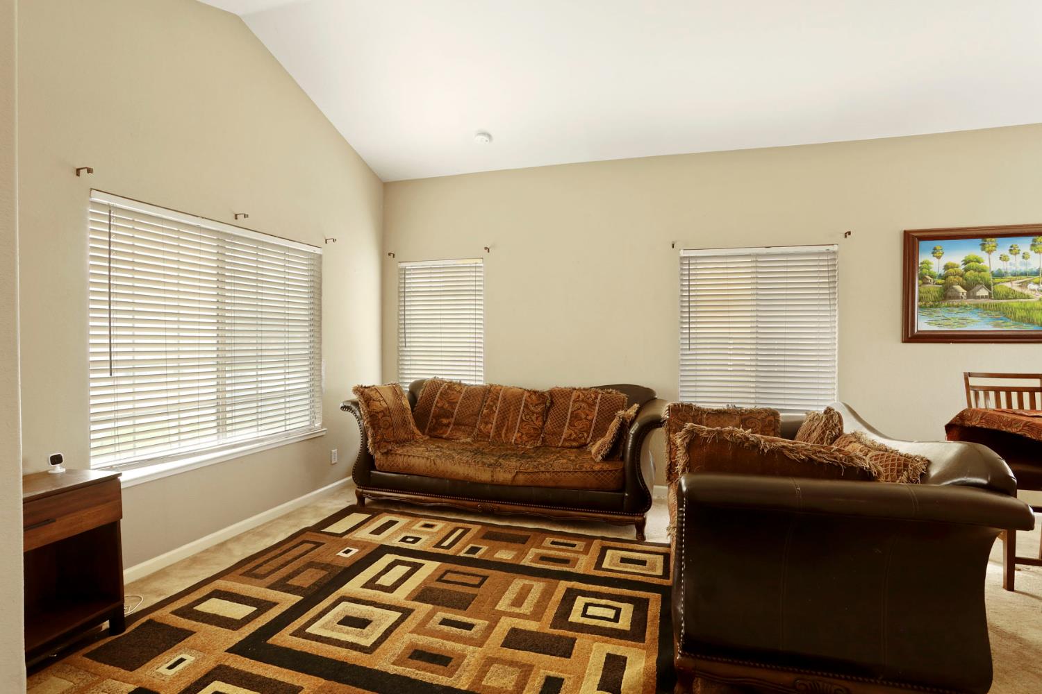 1725 Mark Mead Lane Modesto, CA 95356 - Photo 3 of 52 a living room with furniture and a window