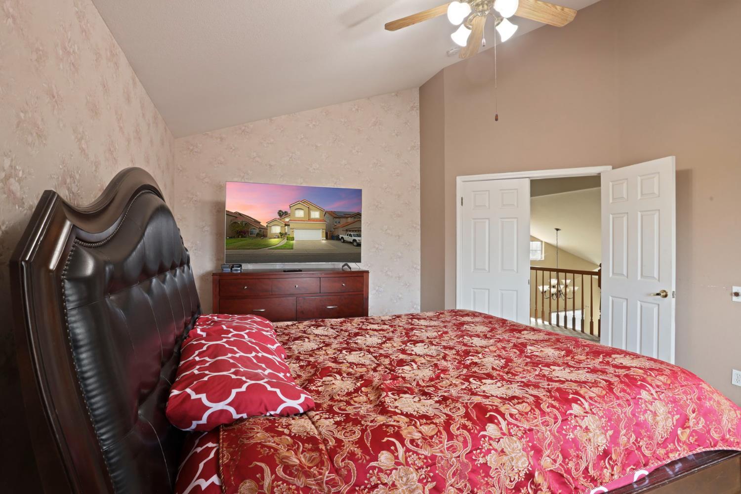 1725 Mark Mead Lane Modesto, CA 95356 - Photo 34 of 52 a bedroom with a bed and a dresser