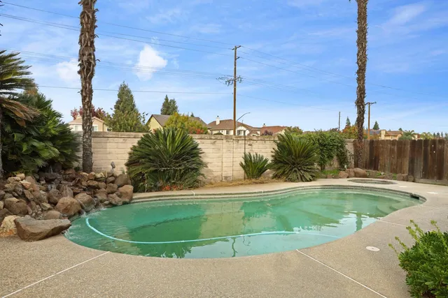 a backyard of a house with lots of green space