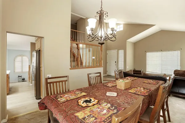 a view of a dining room with furniture