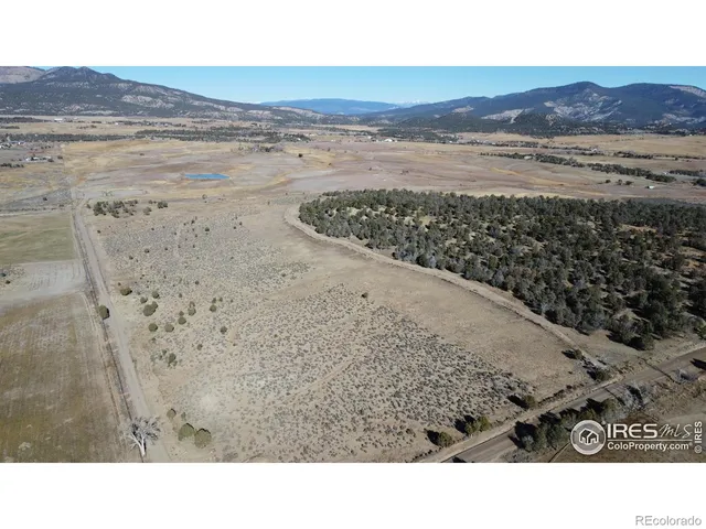 a black and white photo of a road