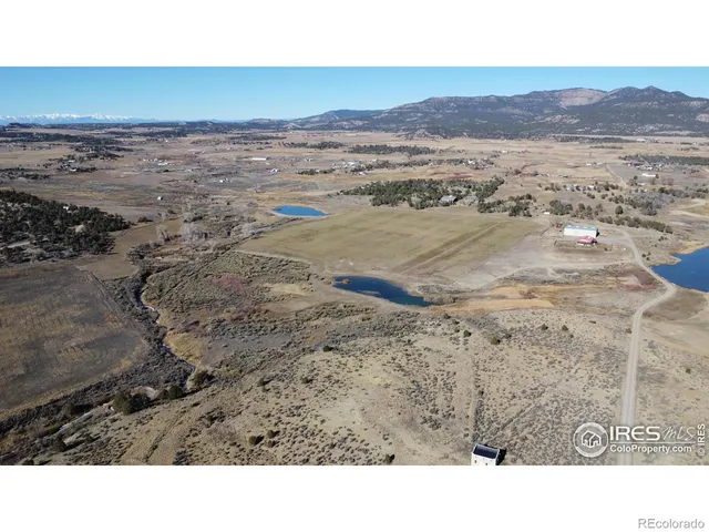 a black and white photo of a beach
